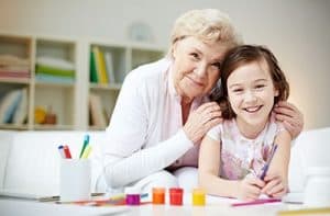 Portrait of old woman and a young girl painting